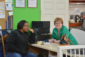 Employees Smiling at Camera